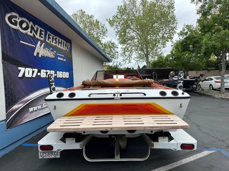 Slide: The Image of 1988 Malibu Skier boat parked outside Gone Fishin' Marine dealership. - 9