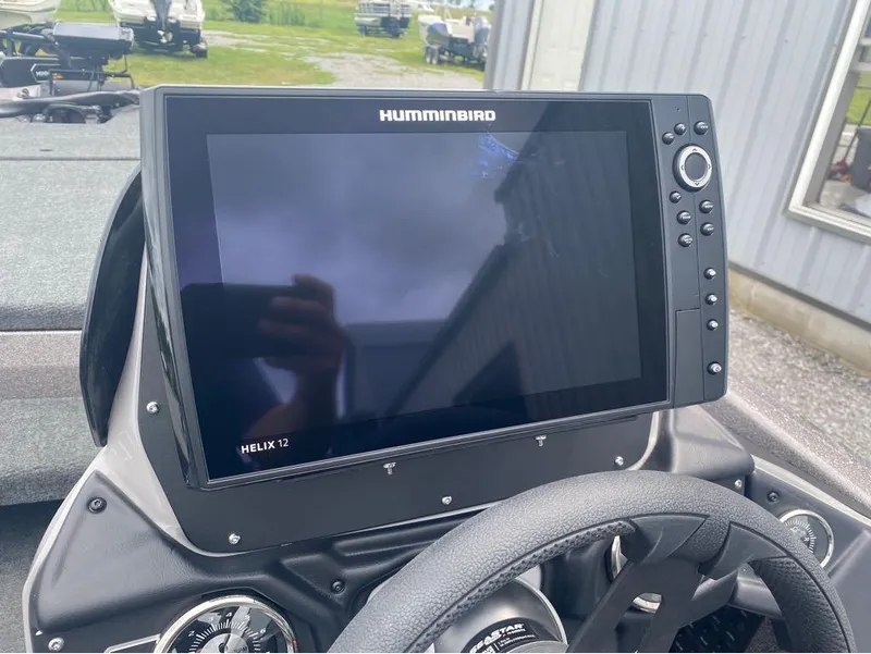 Slide: The Image of Humminbird Helix 12 fishfinder on 2025 Skeeter ZXR 21 boat dashboard. - 4