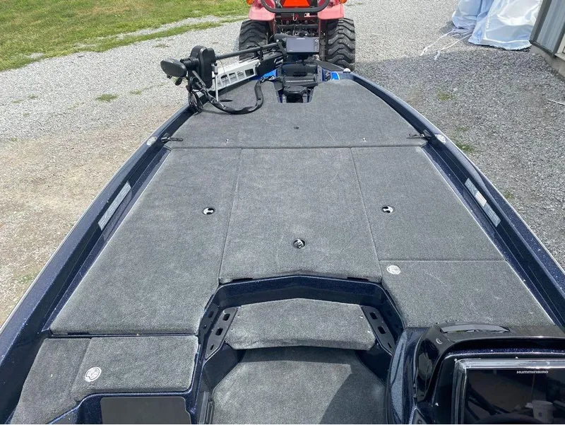 Slide: The Image of 2025 Skeeter ZXR 21 boat deck with advanced fishing equipment and spacious layout. - 12