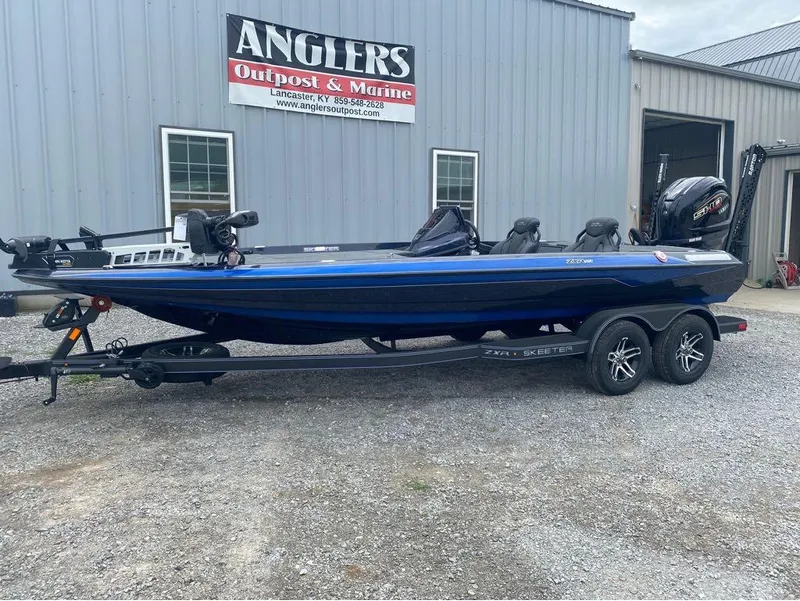 Slide: The Image of 2025 Skeeter ZXR 21 boat on trailer at Anglers Outpost & Marine. - 14