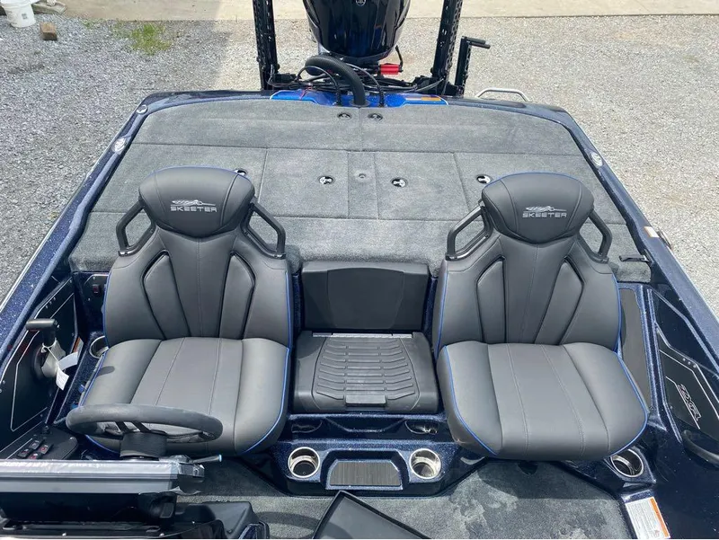 Slide: The Image of 2025 Skeeter ZXR 21 boat interior with dual gray seats and sleek design. - 15