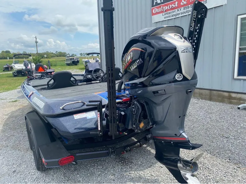 Slide: The Image of 2025 Skeeter ZXR 21 boat with Yamaha 250 engine, parked outside dealership. - 9