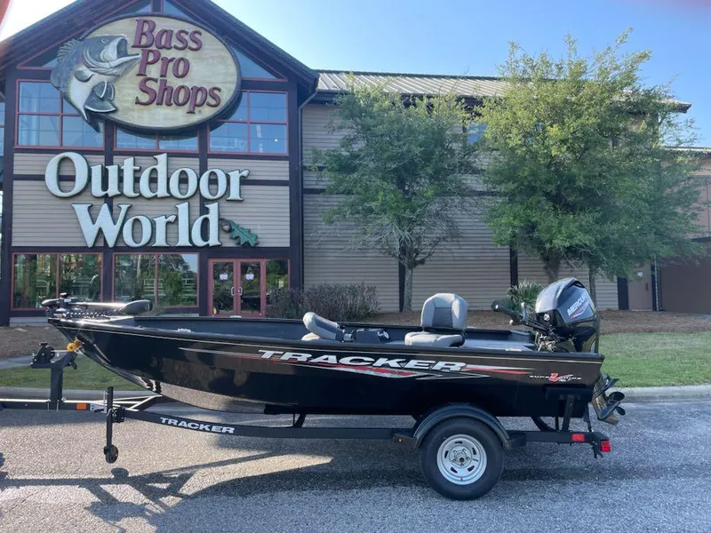 Slide: The Image of 2025 Tracker Super Guide V-16 T boat outside Bass Pro Shops Outdoor World. - 5