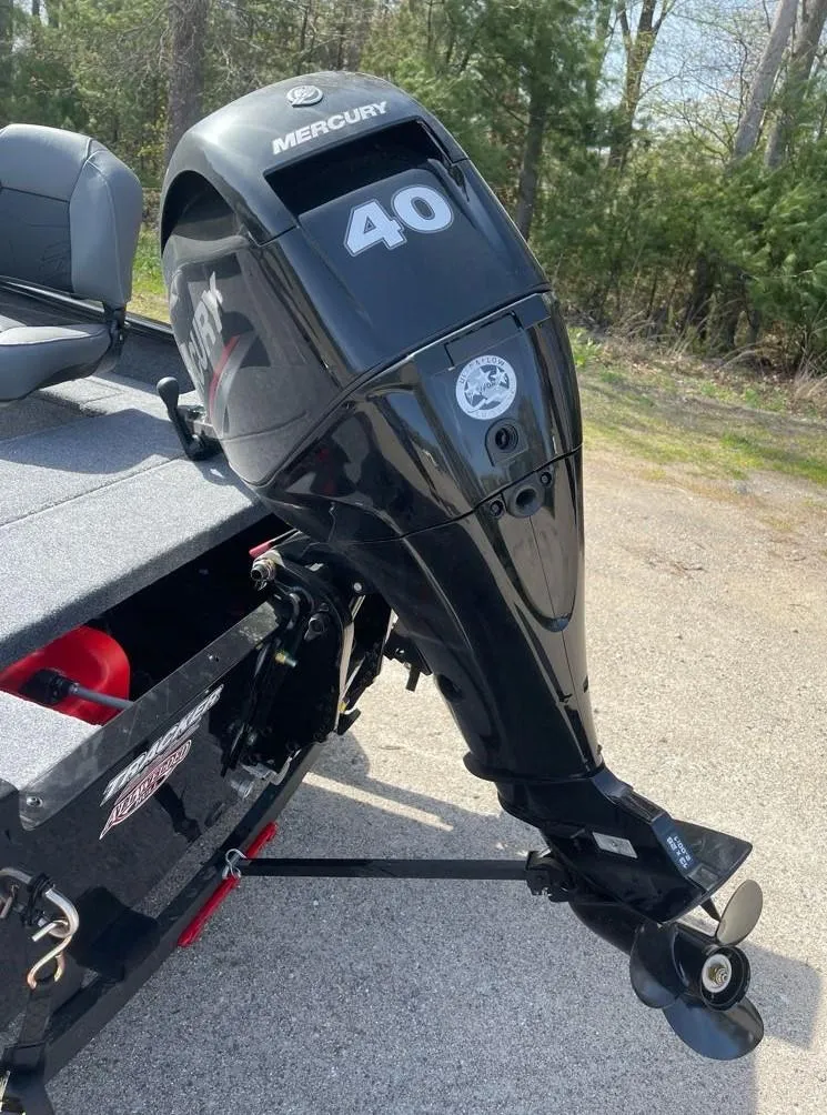 Slide: The Image of 2025 Tracker Super Guide V-16 T with Mercury 40 outboard motor in outdoor setting. - 7