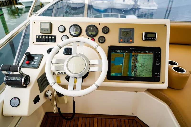 Slide: The Image of Luxurious 2012 Azimut Fly 53 yacht deck with seating and wooden flooring. - 12