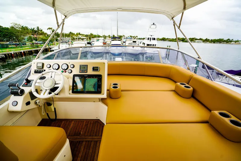 Slide: The Image of Cockpit of 2012 Azimut Fly 53 yacht with navigation controls and steering wheel. - 14
