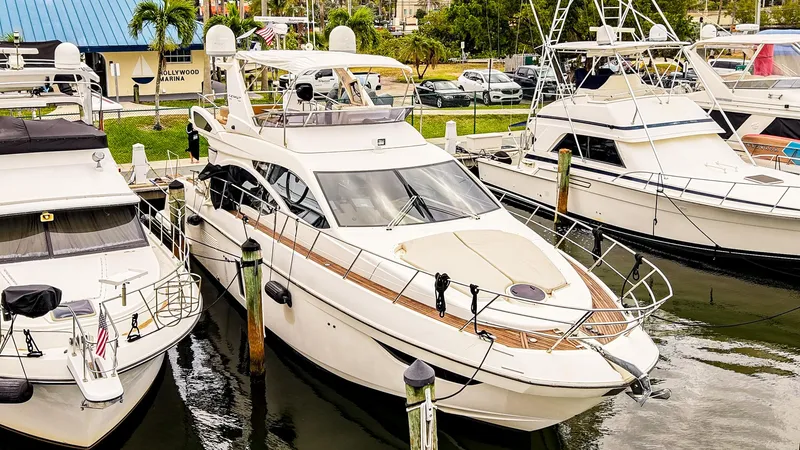 Slide: The Image of 2012 Azimut Fly 53 yacht docked with tender boat. - 2