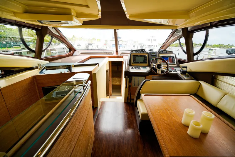 Slide: The Image of Luxurious interior of 2012 Azimut Fly 53 yacht with modern helm and seating area. - 26