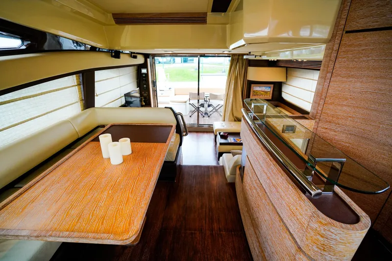 Slide: The Image of Luxurious interior of 2012 Azimut Fly 53 yacht with elegant dining area and modern decor. - 28