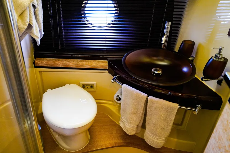 Slide: The Image of Luxurious bathroom in 2012 Azimut Fly 53 yacht with modern sink and toilet. - 39