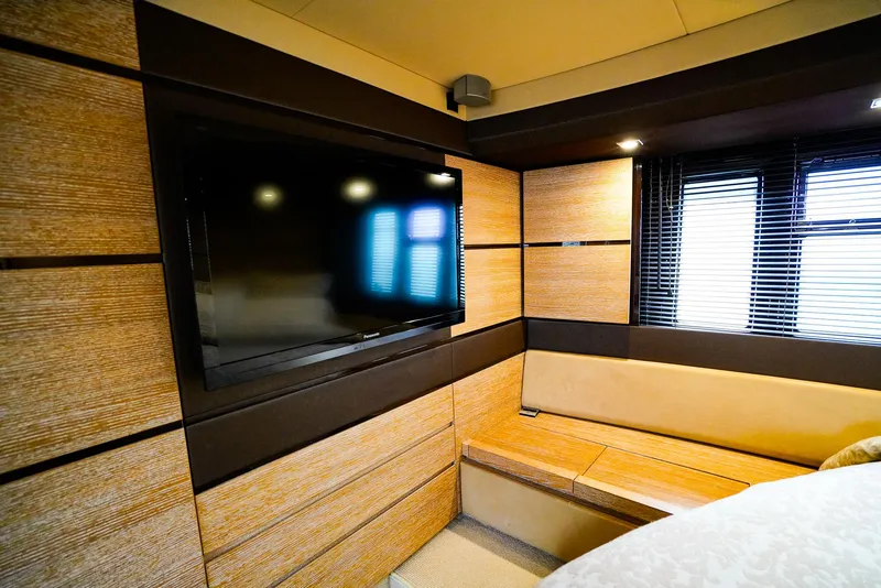 Slide: The Image of Luxurious interior of 2012 Azimut Fly 53 yacht with modern TV and seating area. - 44