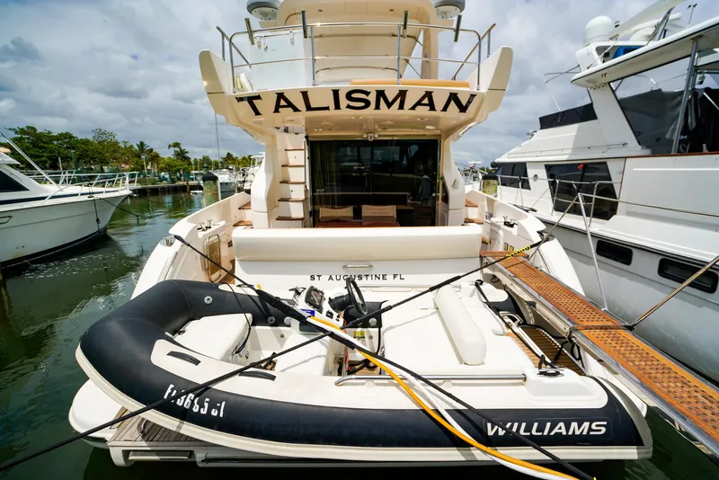 Slide: The Image of Azimut Fly 53 yacht, 2012 model, docked with inflatable boat, named "Talisman," in St. Augustine, FL. - 49