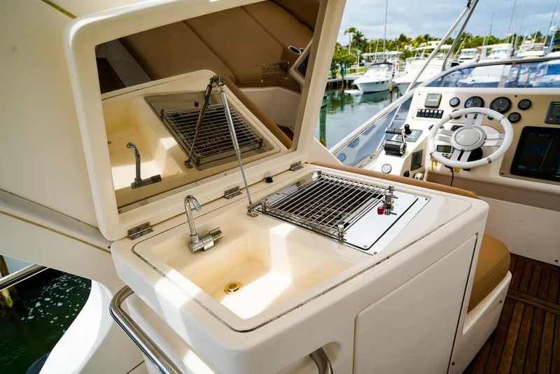 Slide: The Image of Luxurious Azimut Fly 53 yacht deck with seating and table, 2012 model. - 8