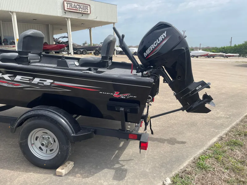 Slide: The Image of 2025 Tracker Super Guide V-16 T boat with Mercury outboard motor on trailer. - 4
