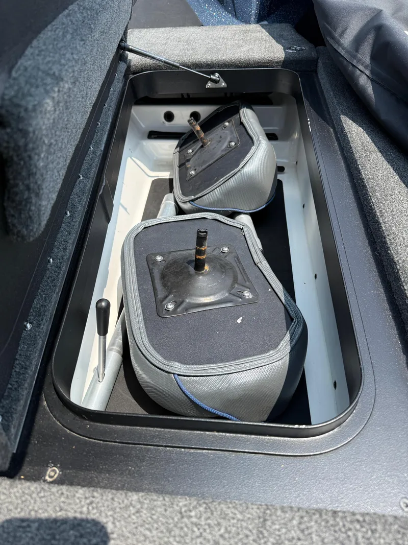 Slide: The Image of 2023 Skeeter ZXR20 boat storage compartment with seat bases. - 16