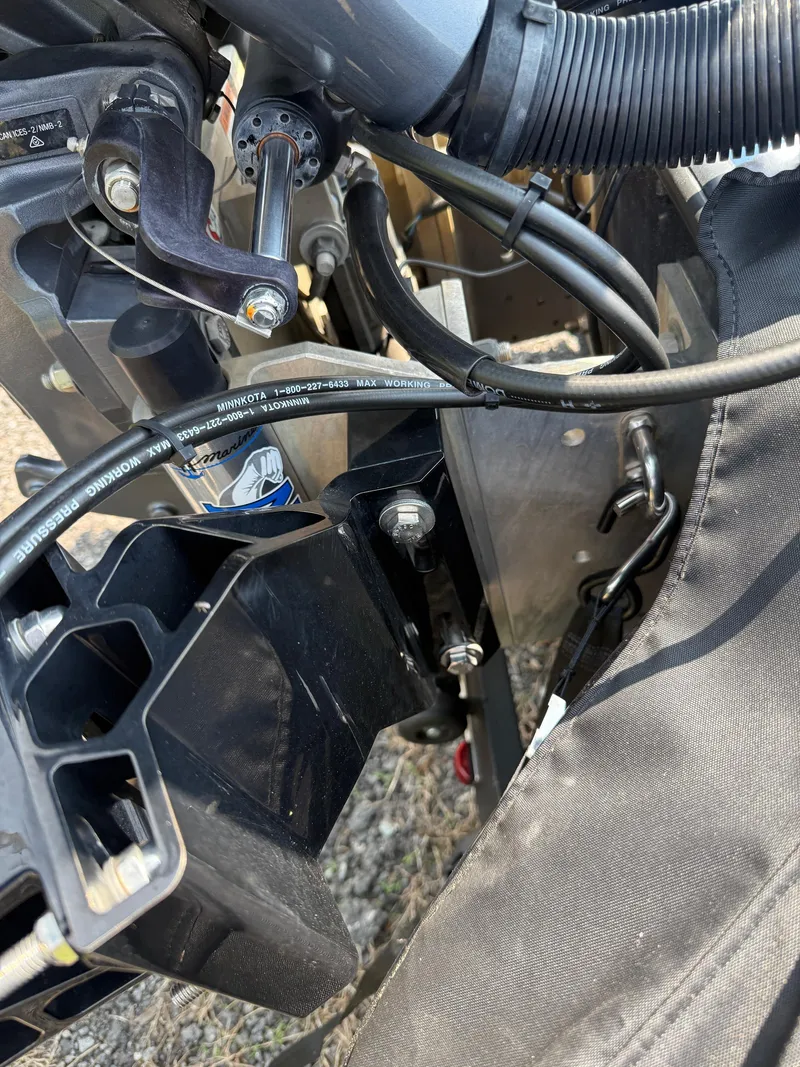 Slide: The Image of Close-up of 2023 Skeeter ZXR20 boat engine components and wiring. - 21