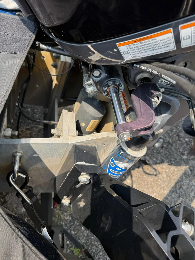 Slide: The Image of 2023 Skeeter ZXR20 boat engine components and hydraulic system close-up. - 24