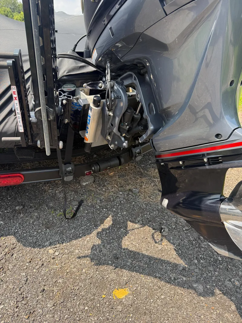 Slide: The Image of 2023 Skeeter ZXR20 boat engine detail on a sunny day. - 25