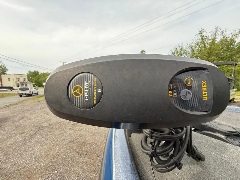 Slide: The Image of 2023 Skeeter ZXR20 boat with i-Pilot Ultrex trolling motor, parked outdoors. - 3