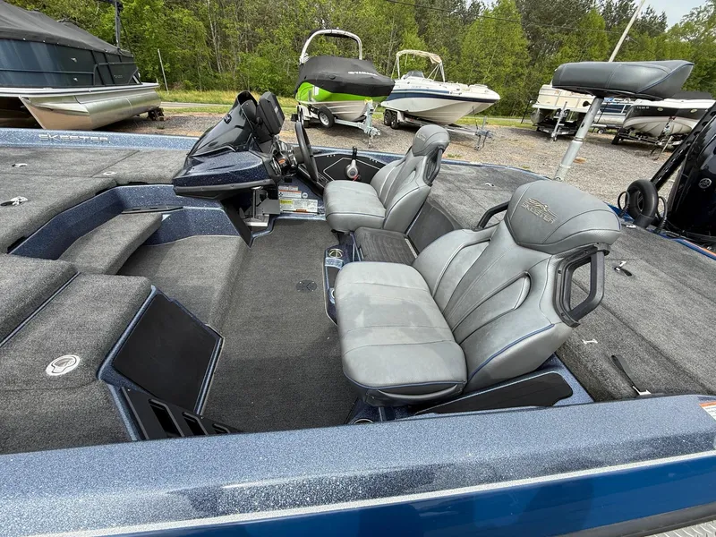Slide: The Image of 2023 Skeeter ZXR20 boat interior with gray seating and spacious deck. - 4