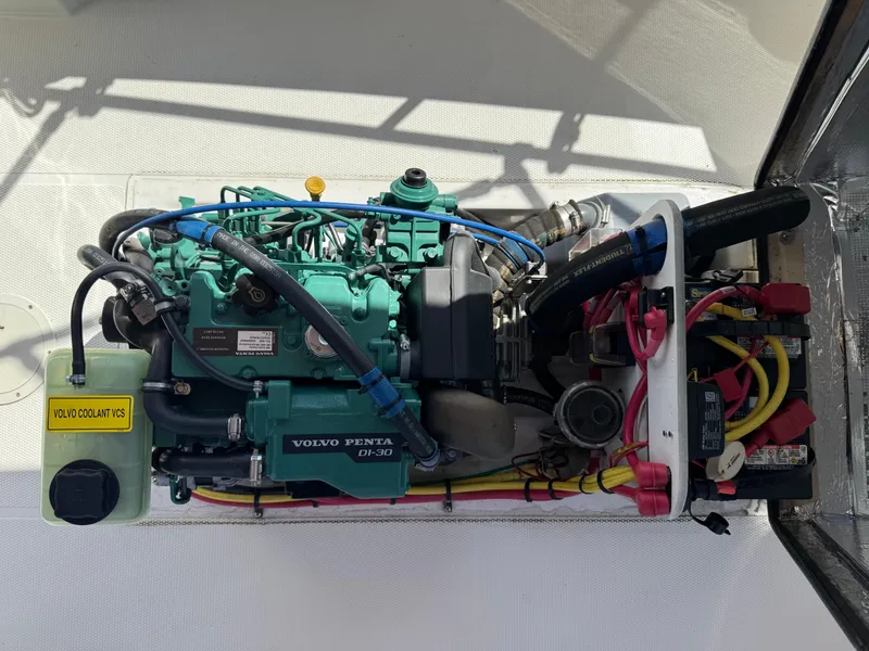 Slide: The Image of Engine compartment of 2016 Ranger Tugs R-21EC with Volvo Penta engine. - 26