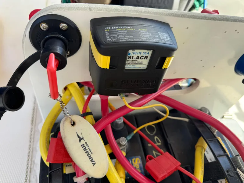 Slide: The Image of Electrical setup on a 2016 Ranger Tugs R-21EC, featuring Blue Sea Systems SI-ACR. - 27