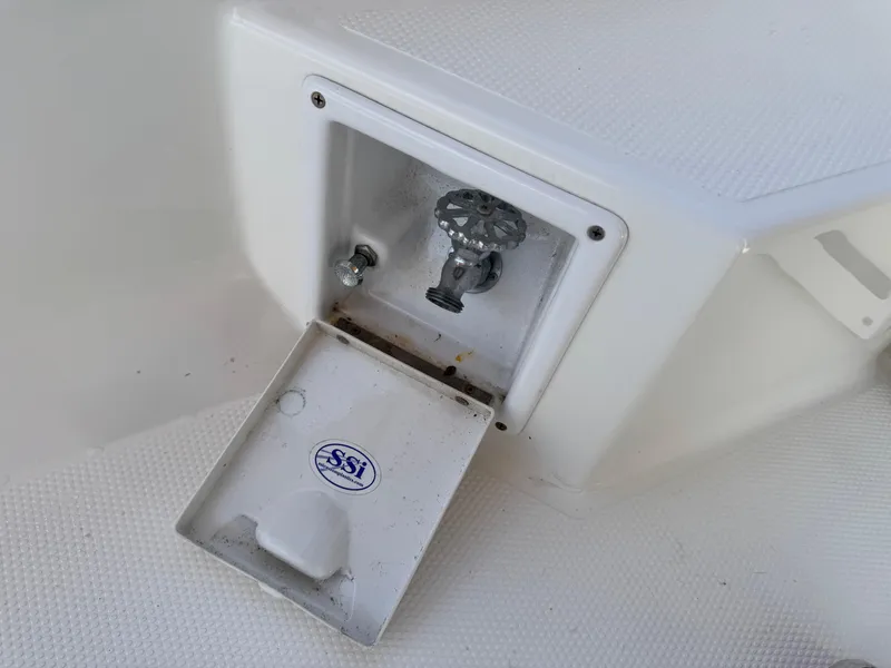 Slide: The Image of Ranger Tugs R-21EC 2016 boat compartment with open hatch and valve. - 30