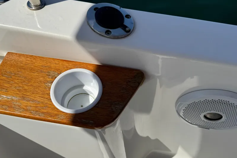 Slide: The Image of Cup holder and speaker on 2016 Ranger Tugs R-21EC boat deck. - 31