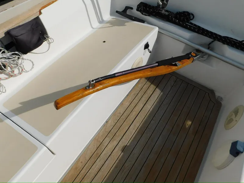 Slide: The Image of Tartan Fantail 2014 sailboat cockpit with wooden tiller and deck details. - 14