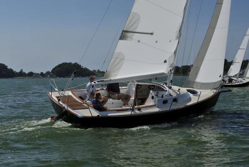 Slide: The Image of Sailing on a 2014 Tartan Fantail yacht in calm waters, under clear skies. - 27