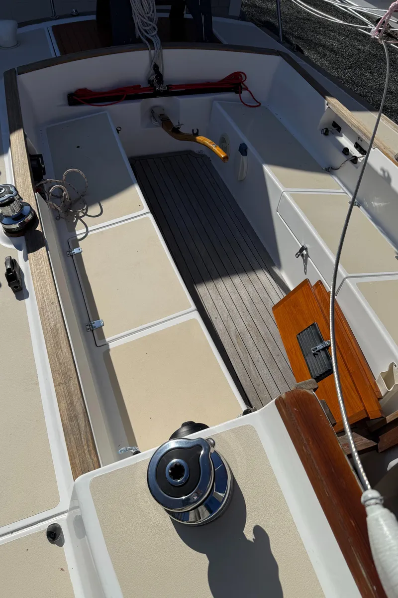 Slide: The Image of 2014 Tartan Fantail sailboat cockpit with winches and wooden accents. - 39