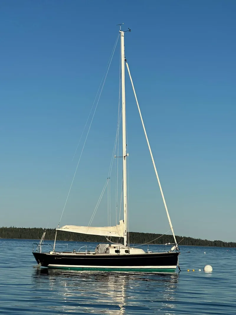 Slide: The Image of Sailboat on calm water, Tartan Fantail 2014, under clear blue sky. - 5