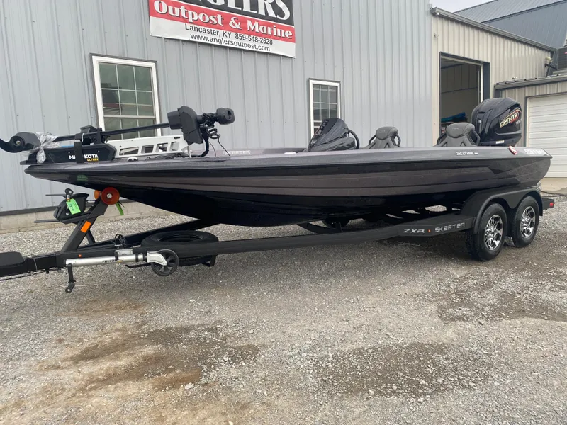 Slide: The Image of 2025 Skeeter ZXR 21 SE boat on trailer outside dealership. - 3