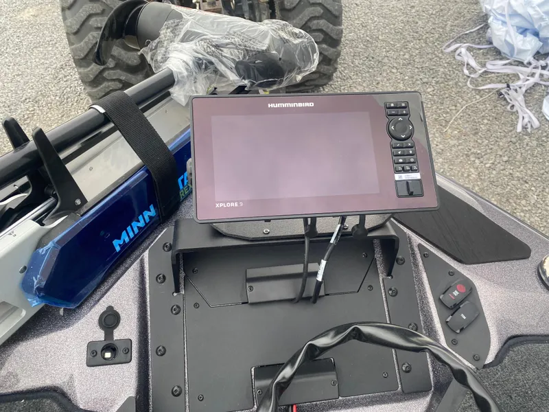 Slide: The Image of 2025 Skeeter ZXR 21 SE boat dashboard with Humminbird sonar and Minn Kota trolling motor. - 8