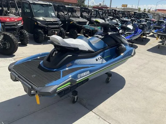 Slide: The Image of 2024 Yamaha Waverunner VX Cruiser in a showroom, surrounded by other vehicles. - 3