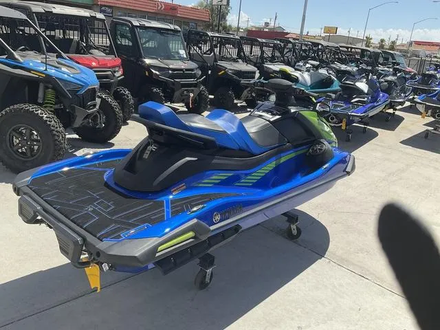 Slide: The Image of 2024 Yamaha Waverunner VX® Limited HO in a showroom, surrounded by other vehicles. - 3