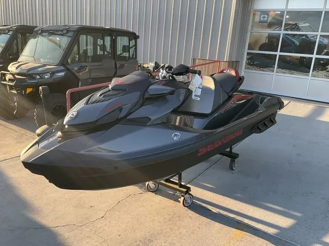 Slide: The Image of 2024 Sea-Doo Waverunner GTR™-X 300 Ibr in a showroom setting. - 1