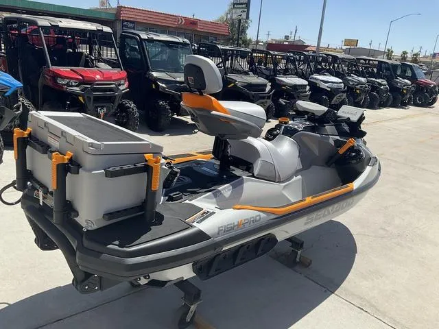 Slide: The Image of 2024 Sea-Doo Fishpro™ Trophy 170 Waverunner displayed in outdoor showroom. - 3
