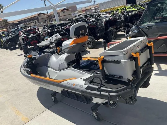 Slide: The Image of 2024 Sea-Doo Waverunner Fishpro™ Trophy 170 with fishing gear, parked outdoors. - 4