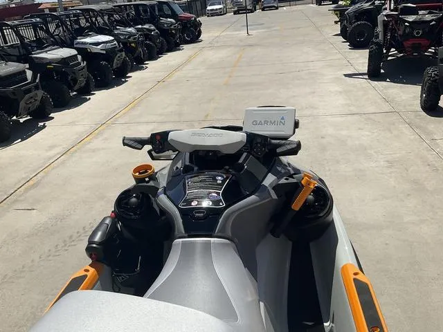 Slide: The Image of 2024 Sea-Doo Waverunner Fishpro™ Trophy 170 with Garmin GPS, parked among other vehicles. - 5