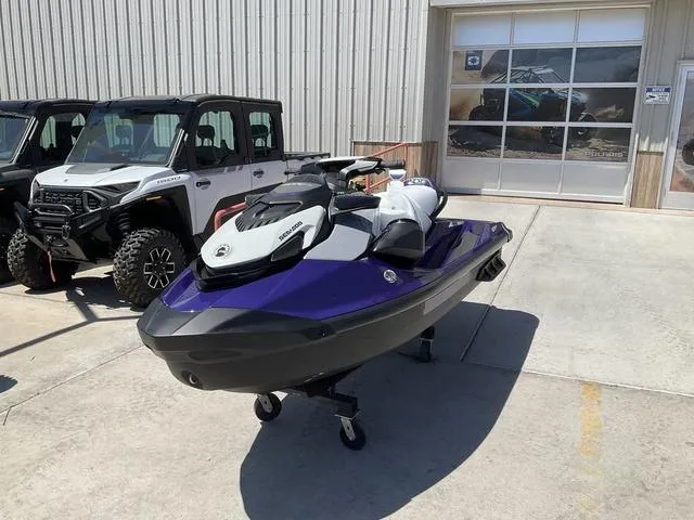 Slide: The Image of 2025 Sea-Doo Waverunner GTI SE 170 in black and purple, featuring advanced tech and audio. - 1