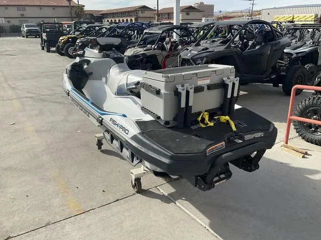 Slide: The Image of 2022 Sea-Doo Fish Pro Sport 170 Waverunner in a parking lot, rear view. - 4