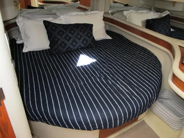 Slide: The Image of Luxurious cabin interior of 1998 Sea Ray 480 Sedan Bridge yacht. - 13