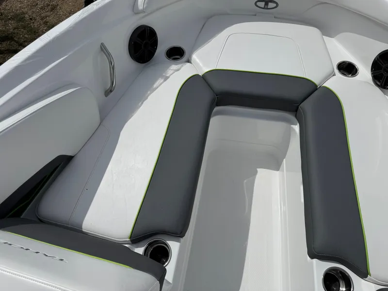 Slide: The Image of Steering console of 2024 Tahoe 210 S boat with modern controls and display. - 6