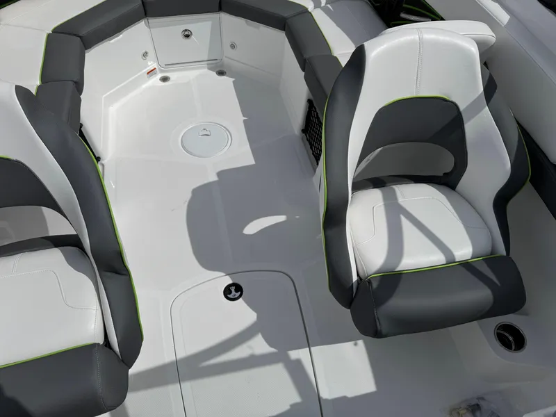 Slide: The Image of Warning labels and capacity information on a 2024 Tahoe 210 S boat. - 9