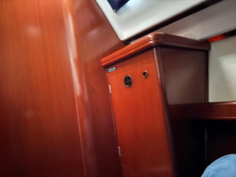 Slide: The Image of Interior of 2002 Beneteau Oceanis Clipper 393 yacht with wooden cabinetry. - 11