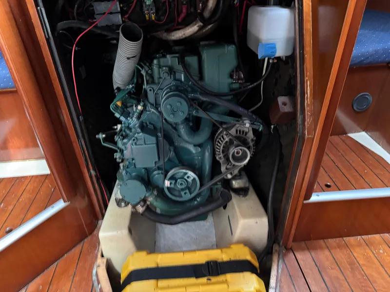 Slide: The Image of Engine compartment of a 2002 Beneteau Oceanis Clipper 393 sailboat, showcasing mechanical components. - 14