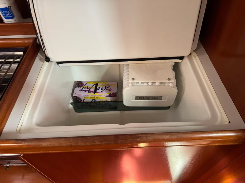 Slide: The Image of Built-in fridge on 2002 Beneteau Oceanis Clipper 393 yacht with LaCroix and ice maker. - 20