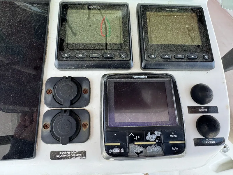 Slide: The Image of Control panel of a 2002 Beneteau Oceanis Clipper 393 sailboat with navigation instruments. - 27