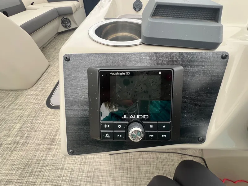 Slide: The Image of JL Audio system on 2022 Harris Cruiser 230 boat, featuring modern interior design. - 15